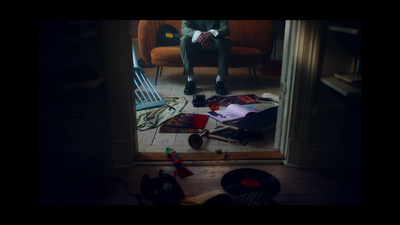 a person sitting in a chair in a room