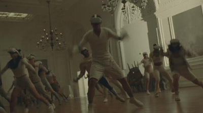 a group of people dancing in a room