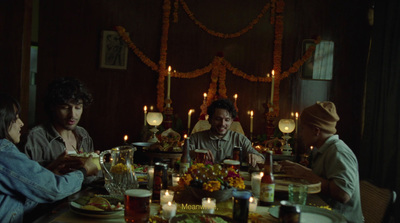 a group of people sitting around a dinner table