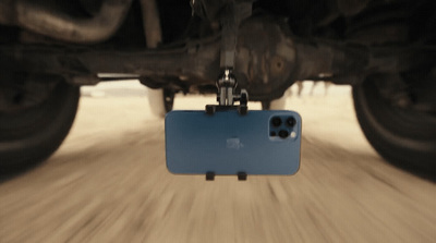 a camera attached to the side of a vehicle