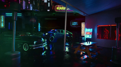 a car parked in a garage with neon lights