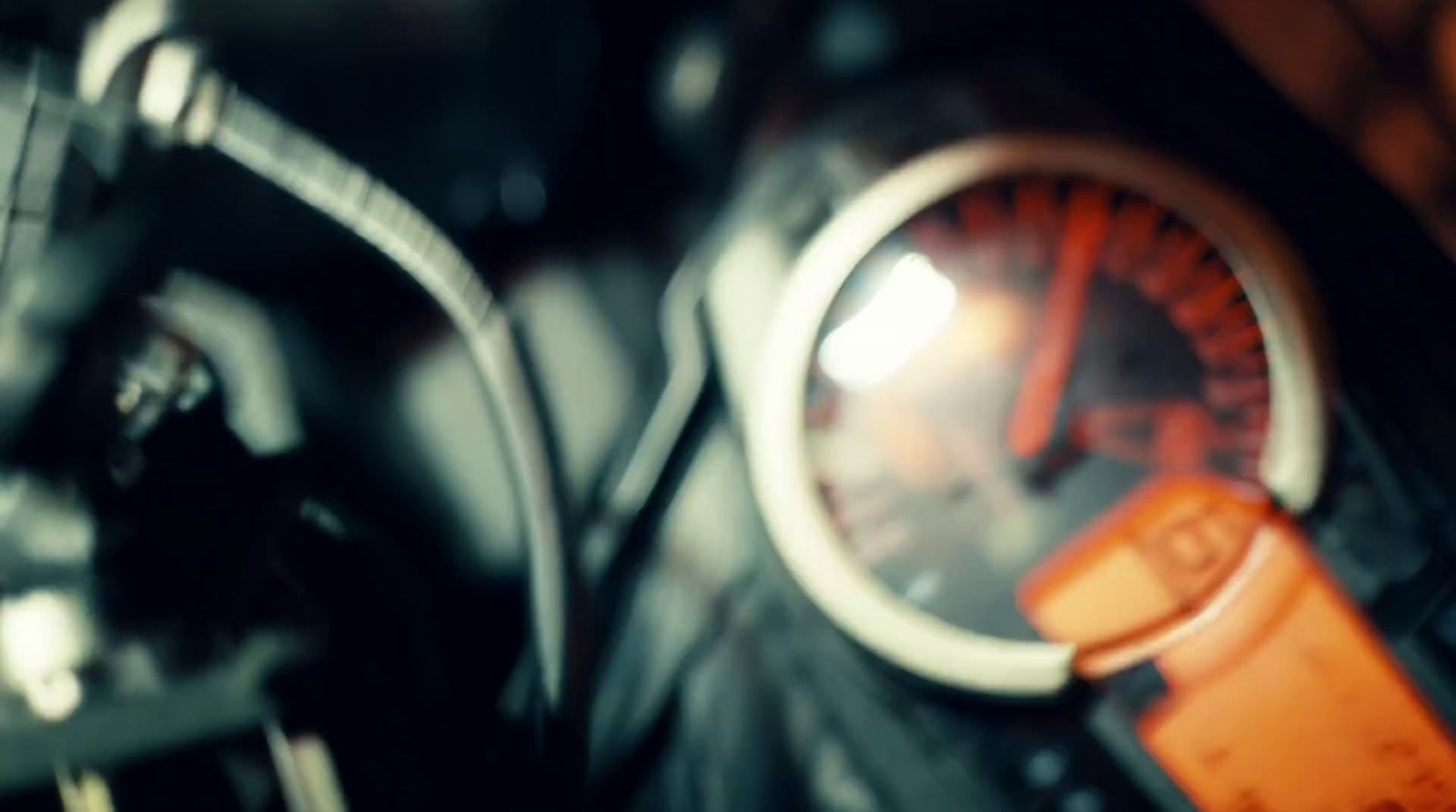 a close up of a speedometer on a motorcycle