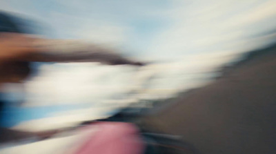 a blurry photo of a person riding a skateboard