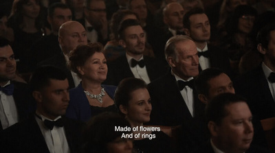 a group of people wearing tuxedos and bow ties