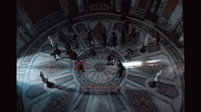 a group of people standing around a large clock