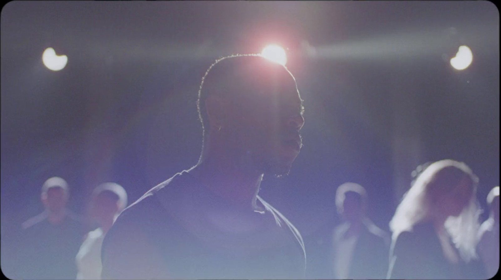 a man standing in front of a crowd of people