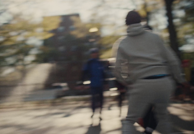 a blurry photo of a person riding a skateboard