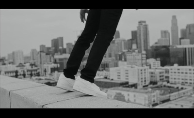 a person standing on top of a building