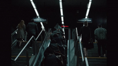 a group of people walking down a flight of stairs