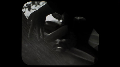 a man riding a skateboard down a wooden ramp