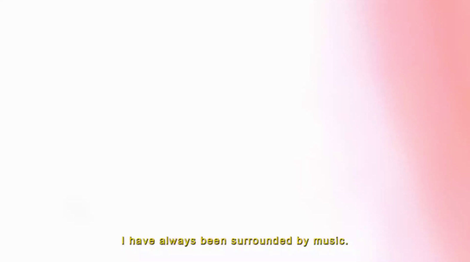 a pink and white background with a quote on it