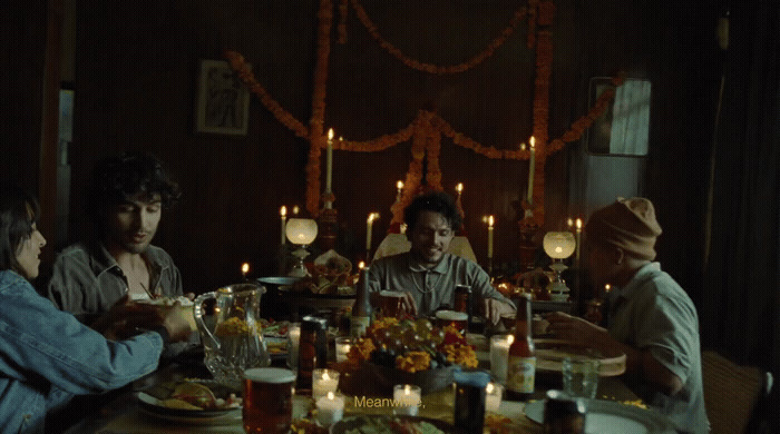 a group of people sitting around a dinner table