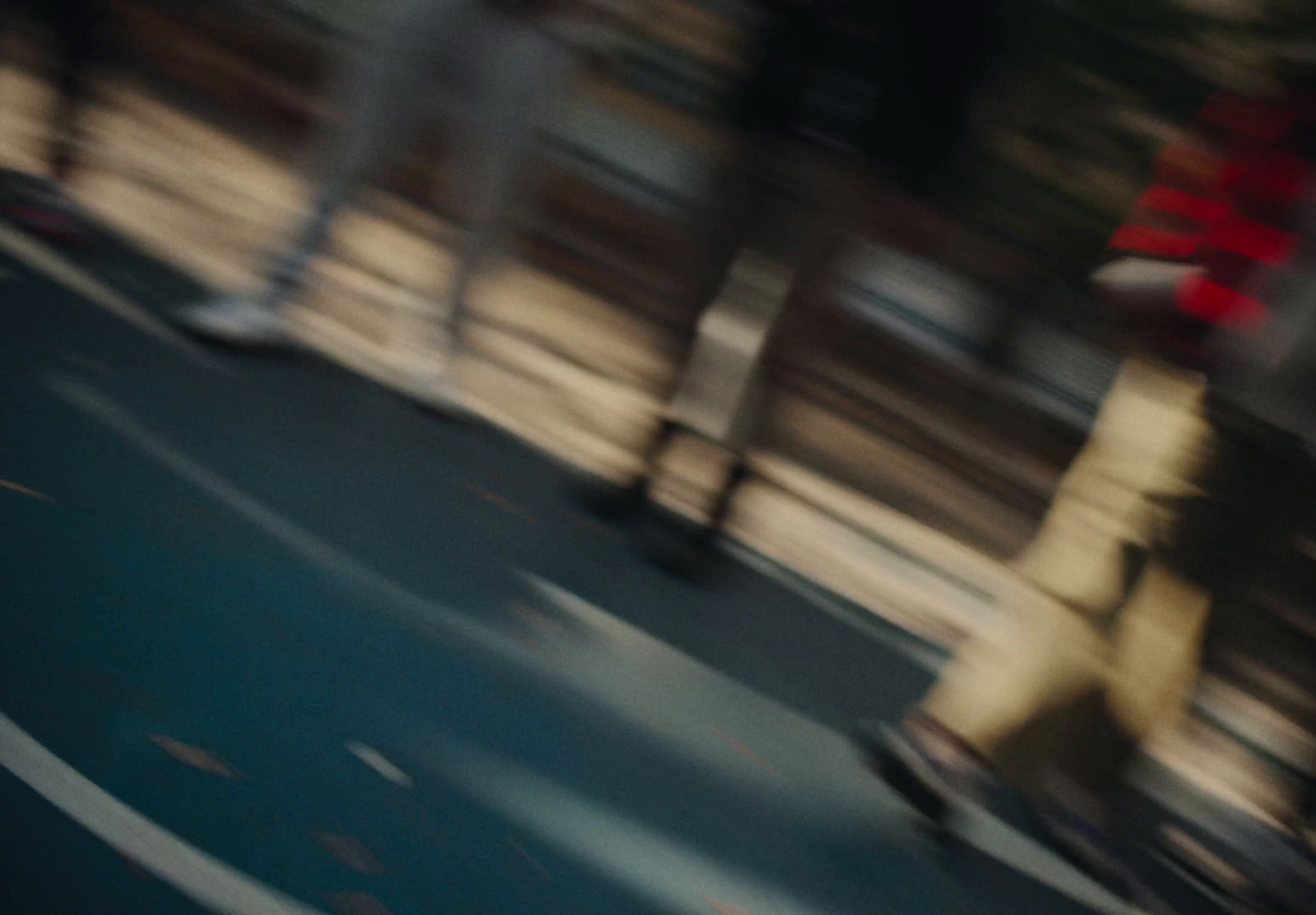 a blurry photo of a person riding a skateboard