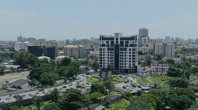 an aerial view of a city with tall buildings