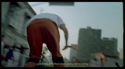 a man riding a skateboard down the side of a building