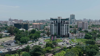 an aerial view of a city with tall buildings