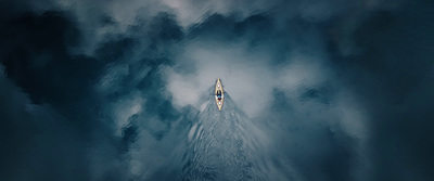 a person in a boat in the middle of a large body of water