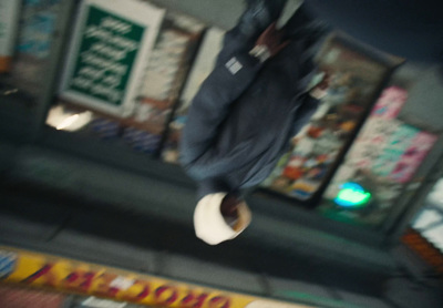 a person flying through the air while riding a skateboard