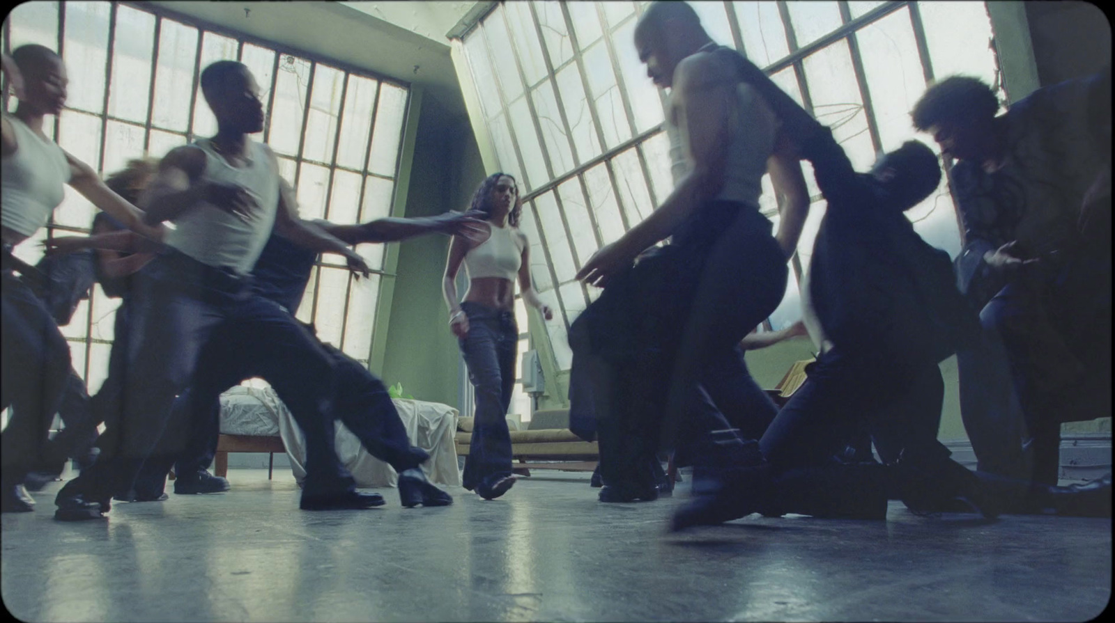 a group of people dancing in a room