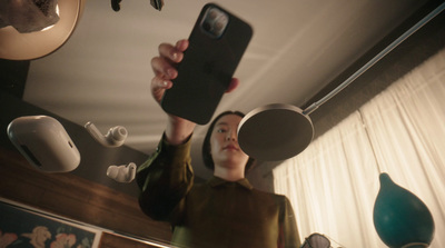 a woman taking a selfie in a mirror