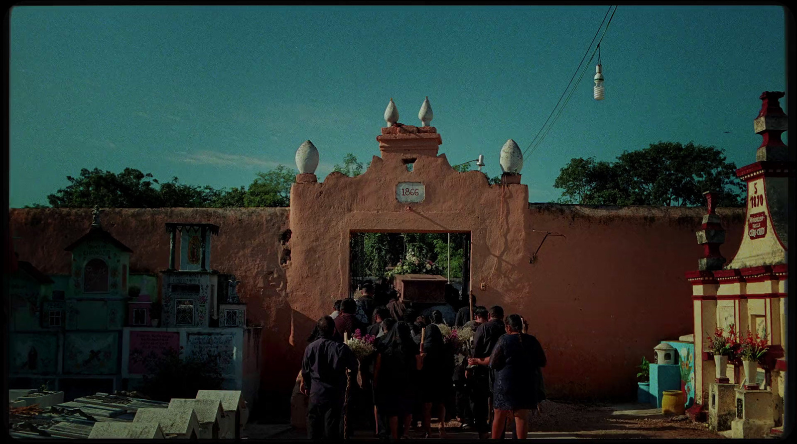 a group of people standing in front of a building