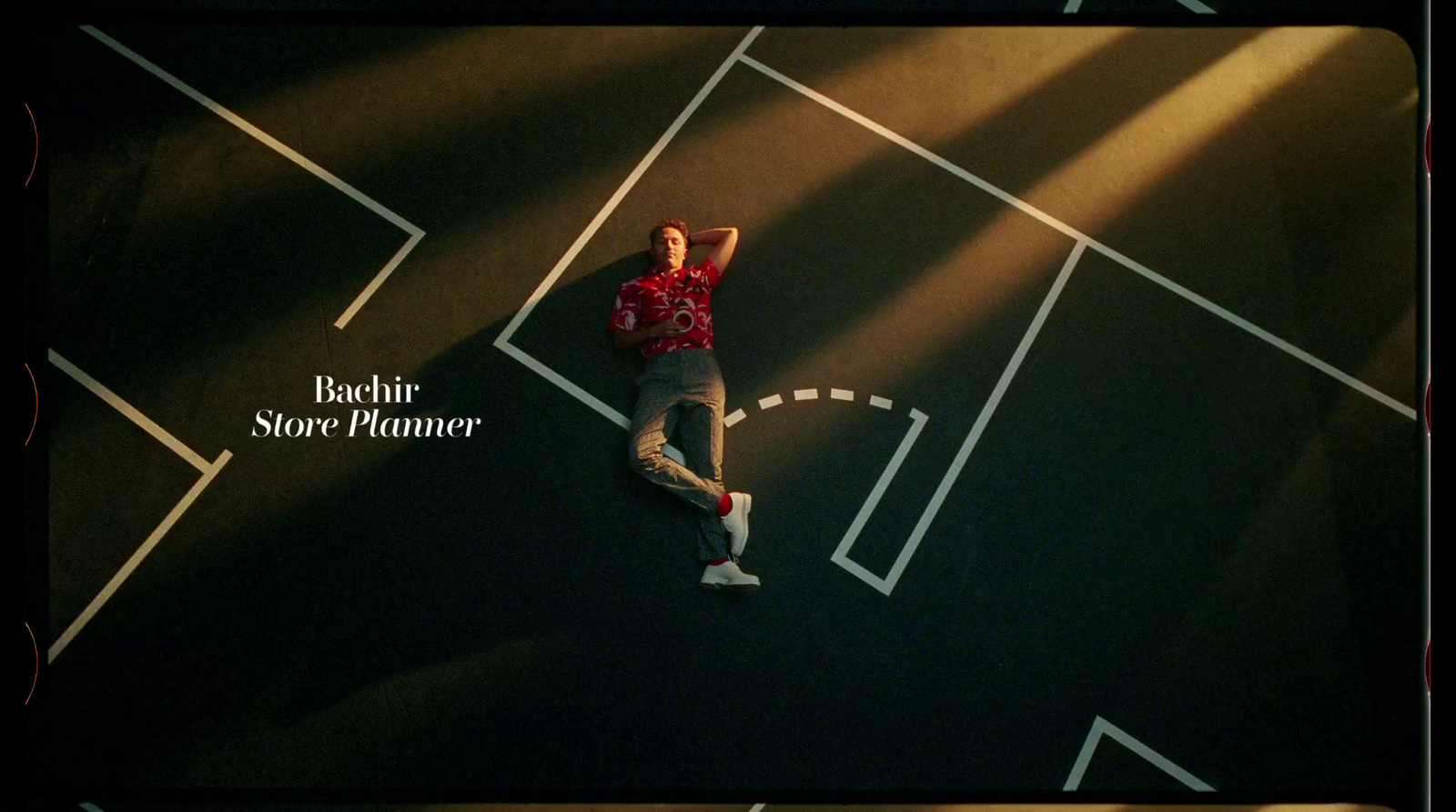 a man standing on top of a tennis court holding a racquet