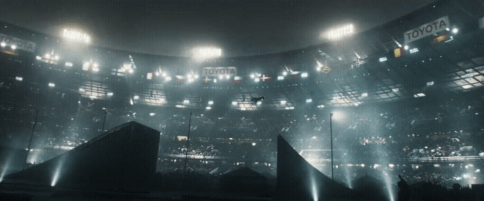 a stadium filled with lots of bright lights