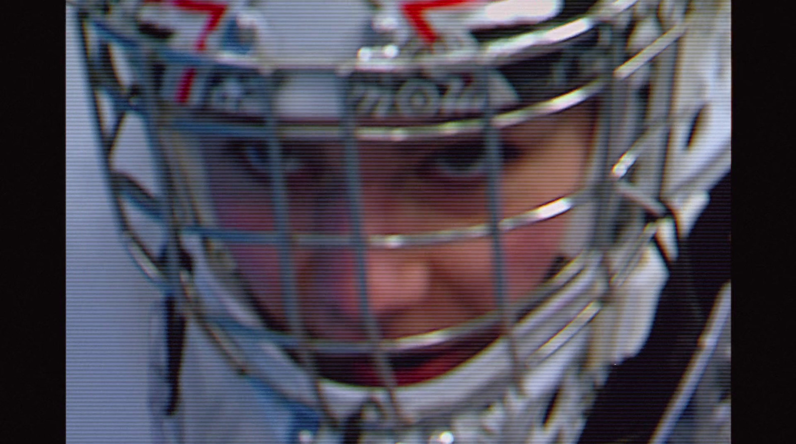 a close up of a hockey goalie's helmet