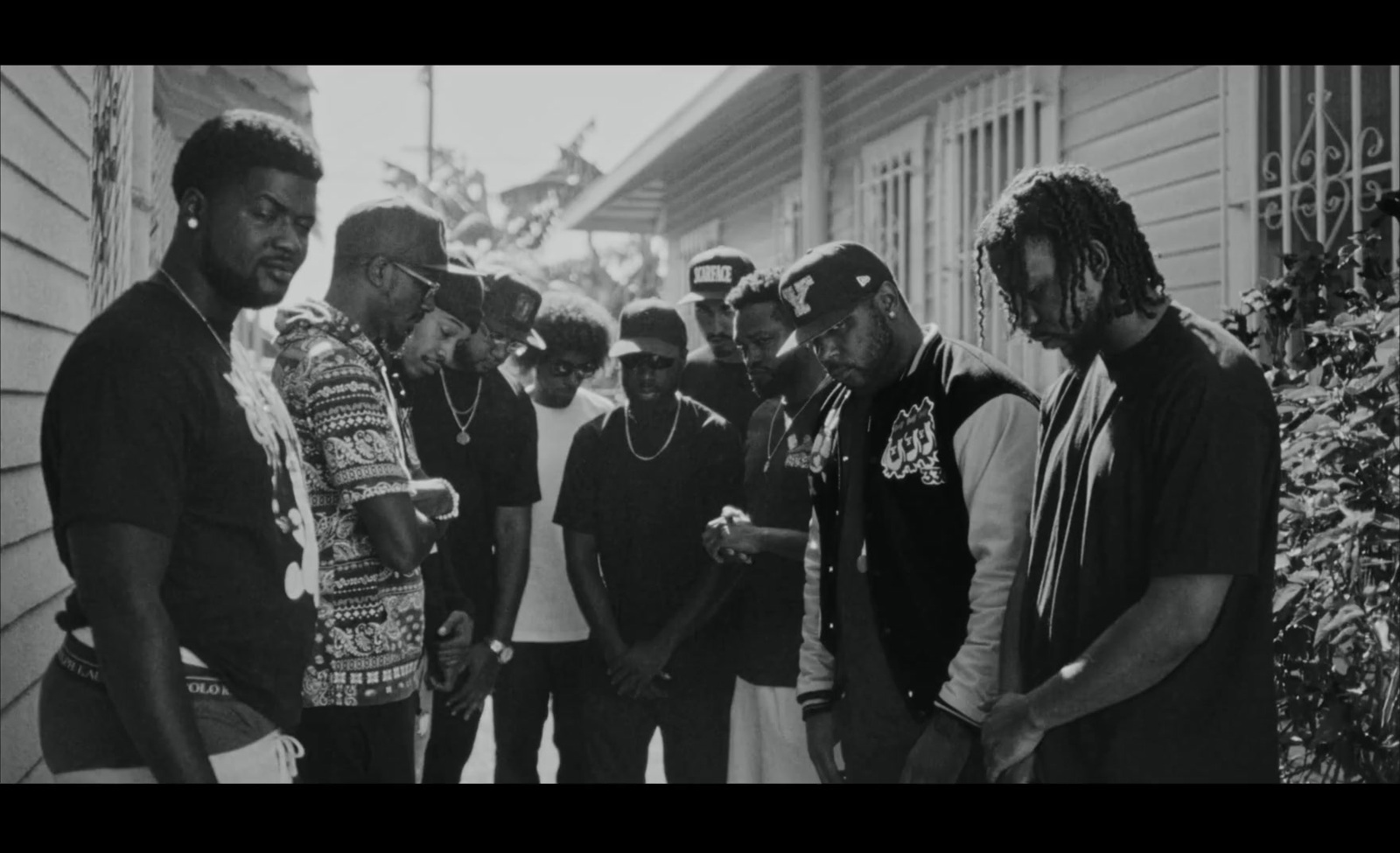 a group of young men standing next to each other