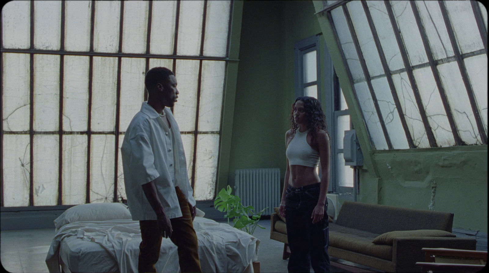 a man and a woman standing in a room