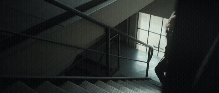 a person walking up a flight of stairs