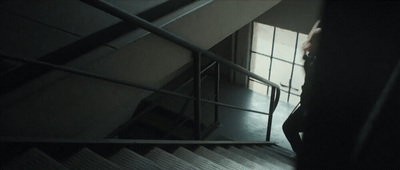 a person walking up a flight of stairs