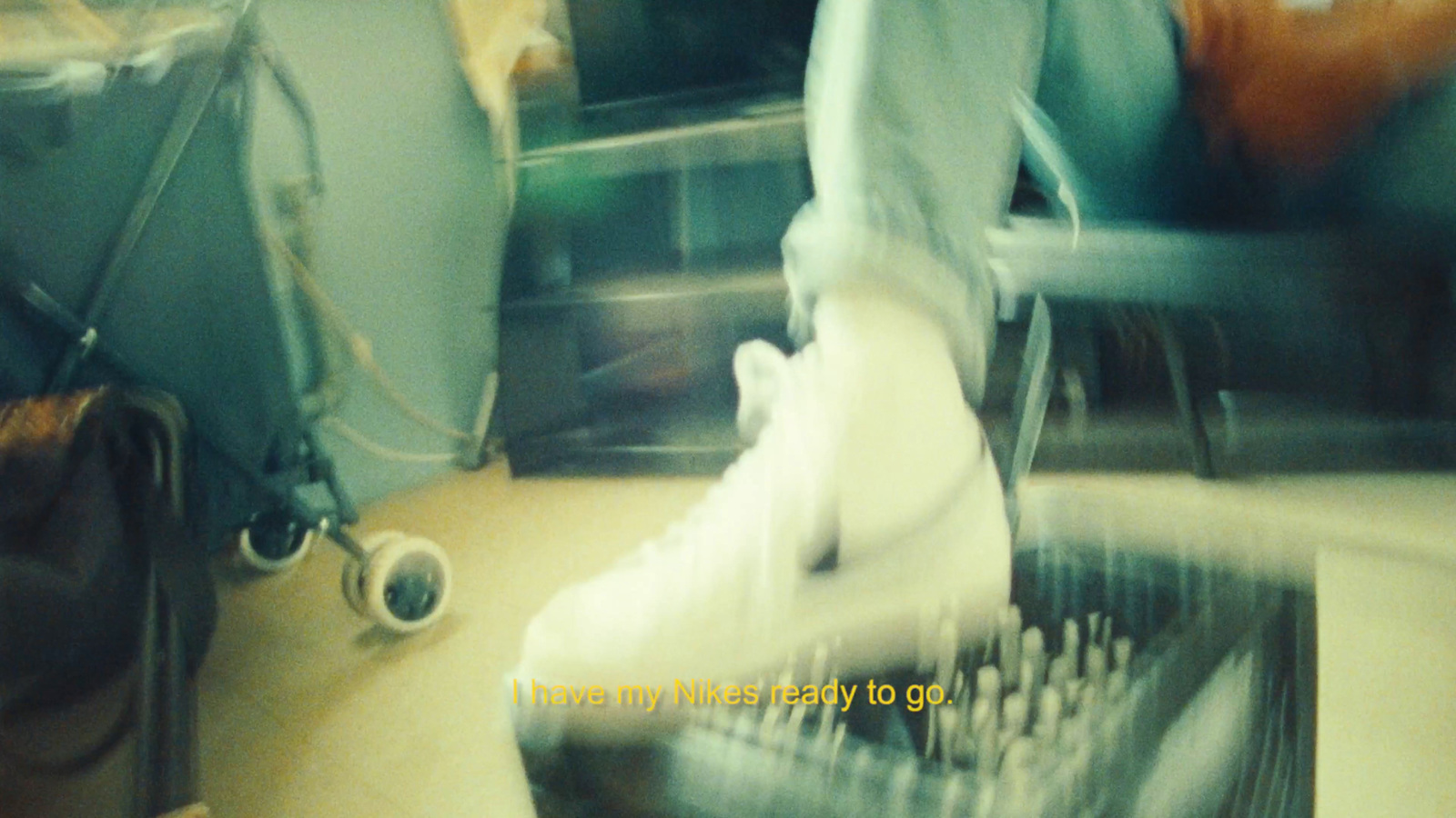 a blurry photo of a person's foot in a chair