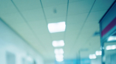 a blurry photo of a hallway in a building