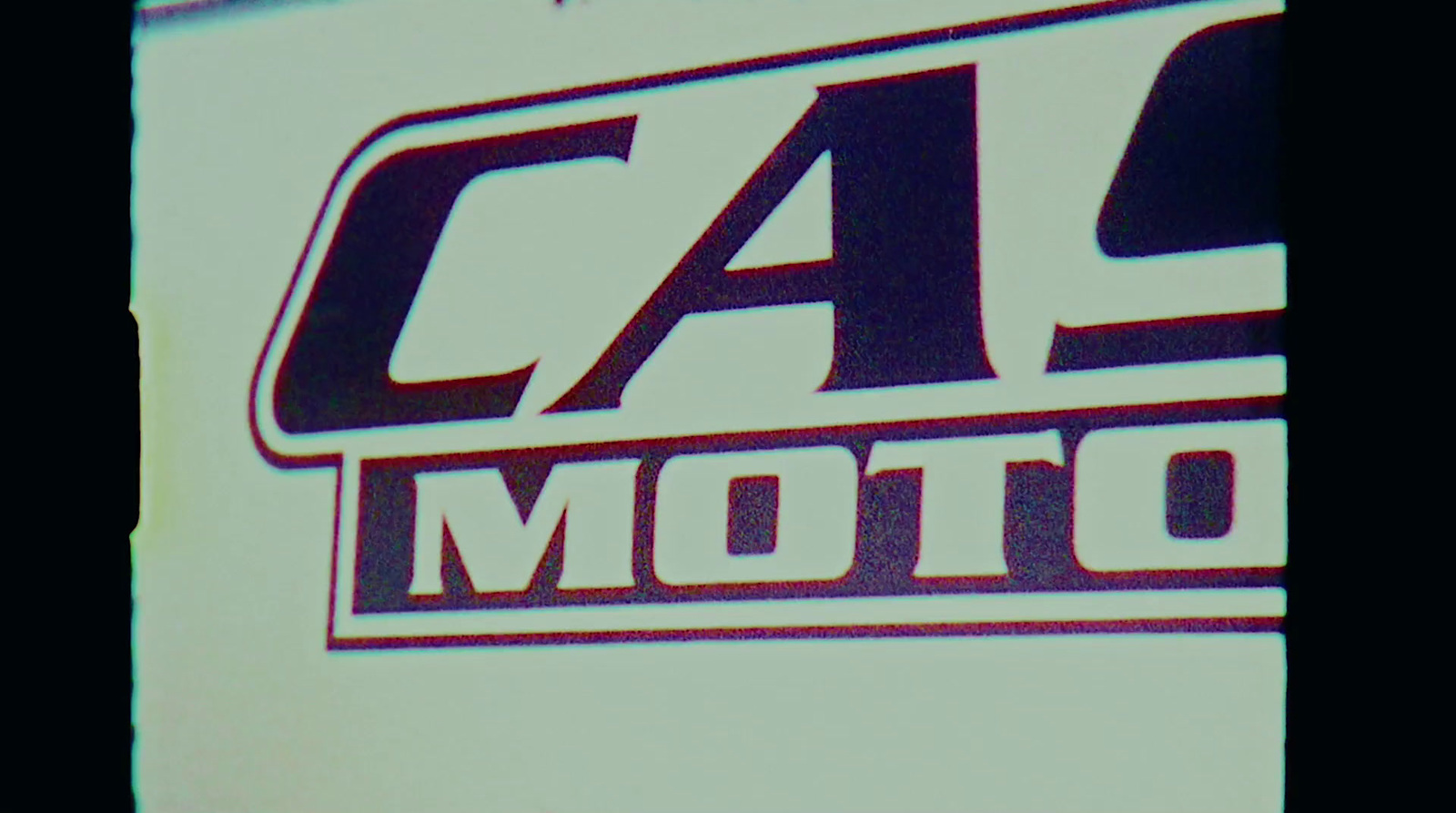 a close up of the cal moto logo