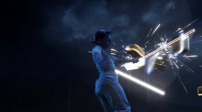 a man holding a baseball bat while standing in front of a firework display