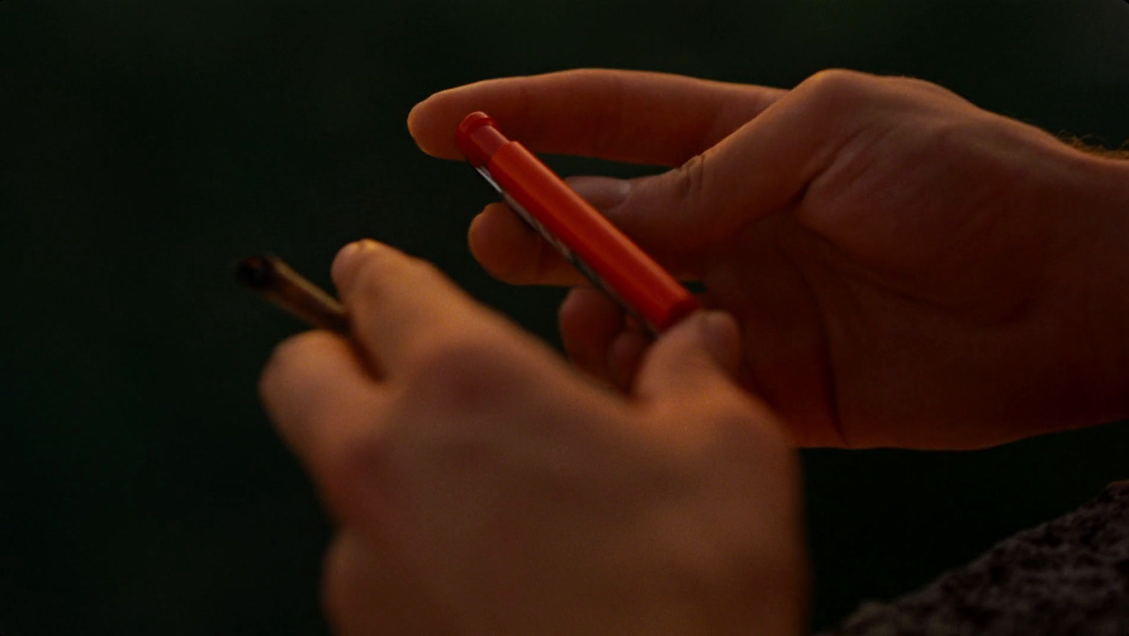 a close up of a person holding a cell phone