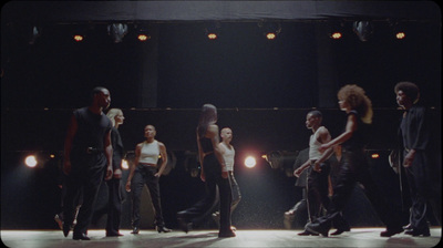 a group of people standing on a stage