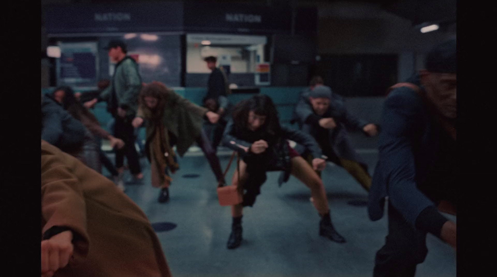 a group of people in a subway station