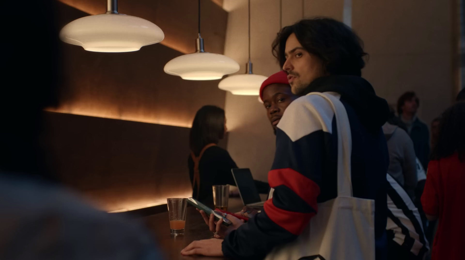 a group of people standing in a room