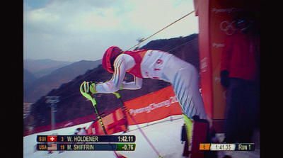 a person on skis doing a trick in the air