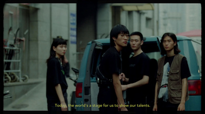 a group of people standing next to a van