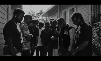 a group of young men standing next to each other