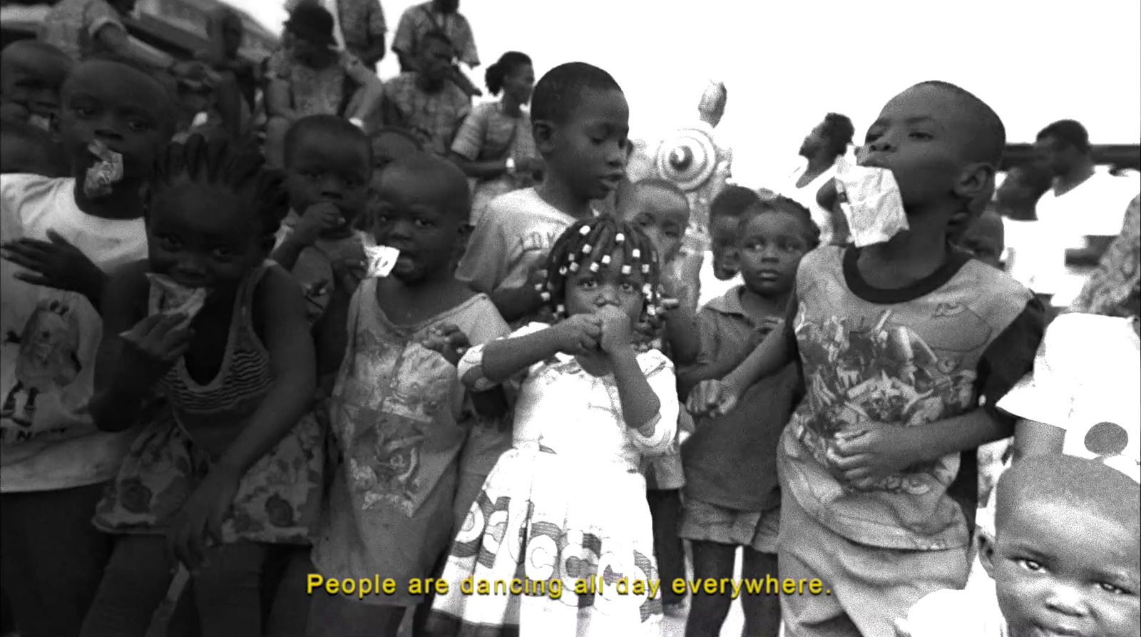 a group of children standing next to each other