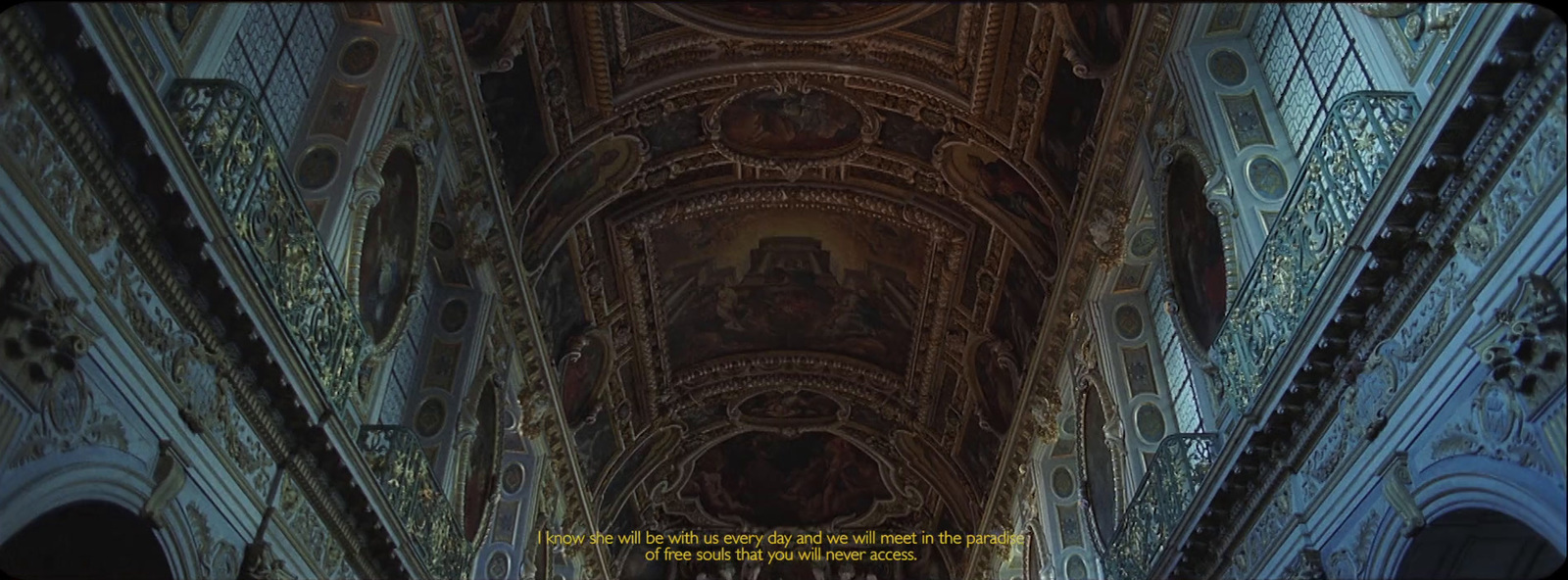 the ceiling of a church with a painting on it