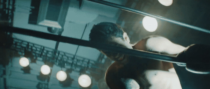 a man is boxing in a boxing ring