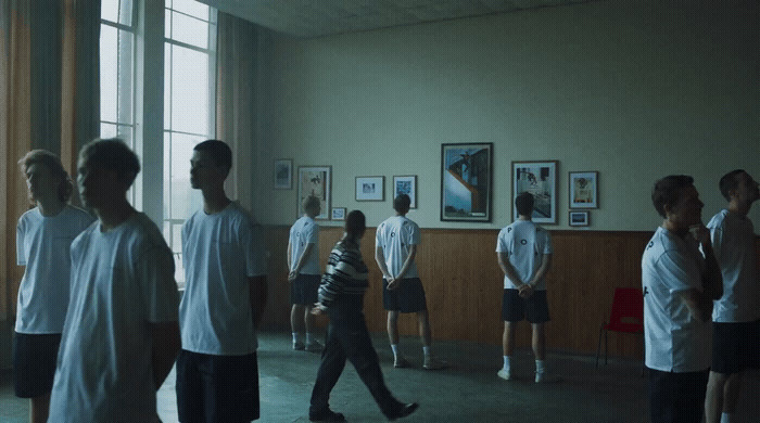 a group of people standing in a room