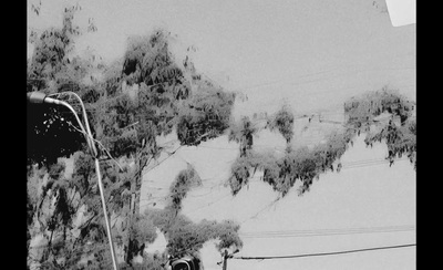 a black and white photo of a ski slope