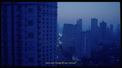 a view of a city at night from a high rise building