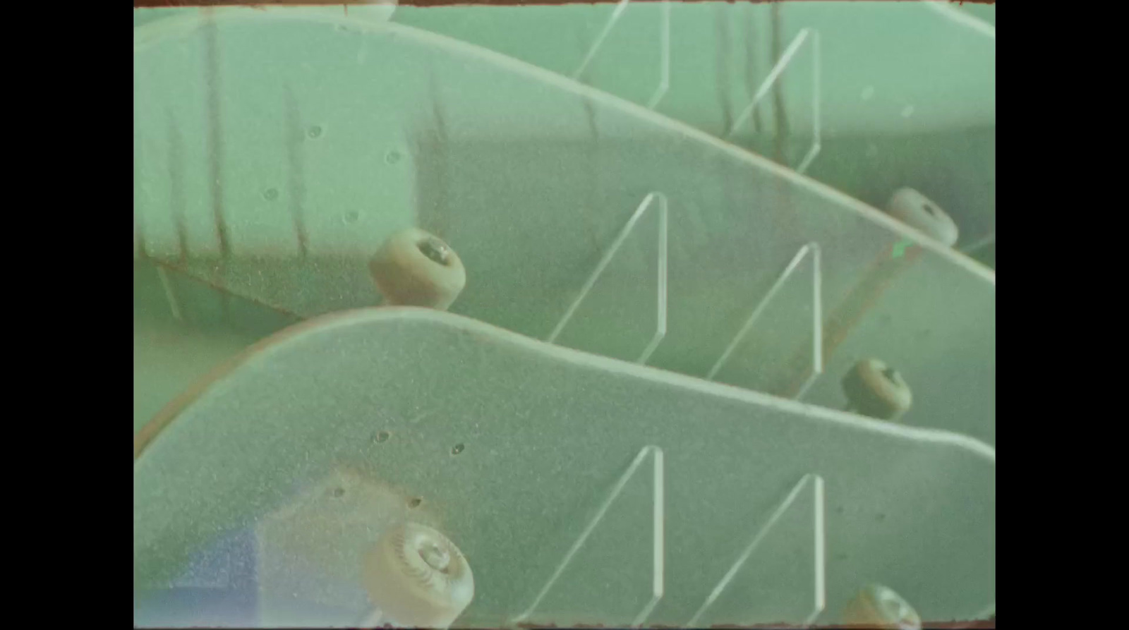 a close up of a skateboard with a blurry background